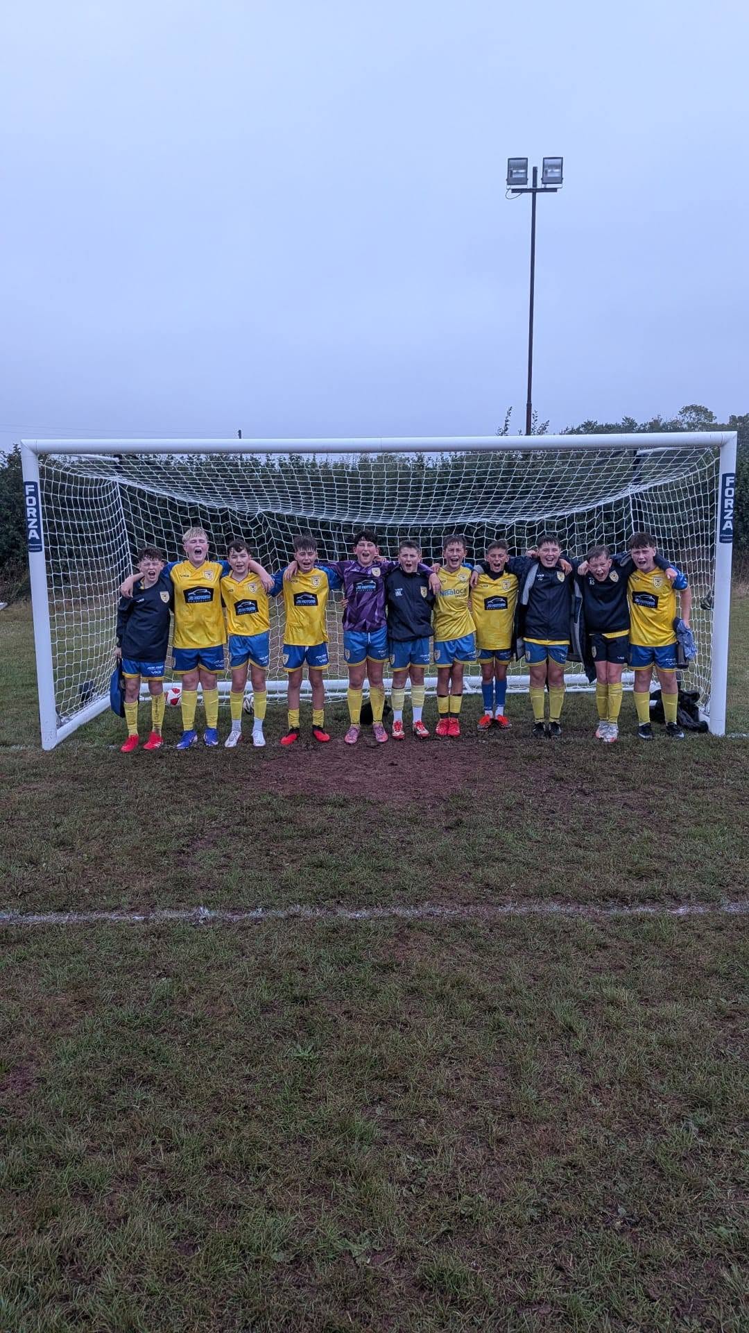 Drefach Under 12 players in front of the goal after a match